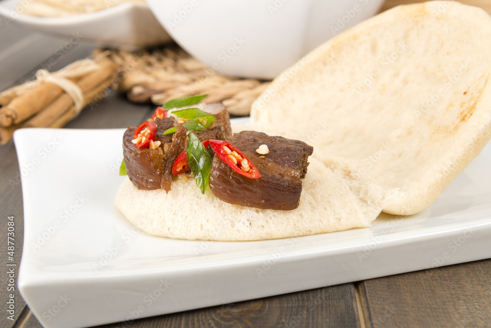 Hong Shao Rou - Chinese braised pork belly in a steamed bun Hong Shao Rou - Chinese braised pork belly in a steamed bun