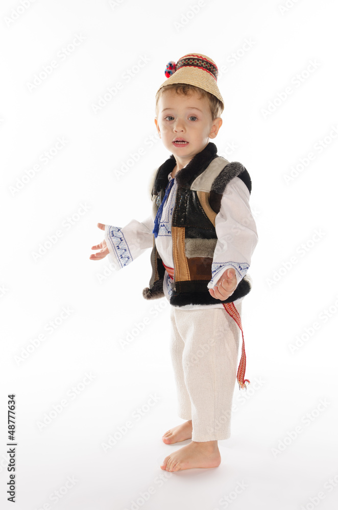 Portrait of beautiful child with traditional folk costume Portrait of beautiful child with traditional folk costume