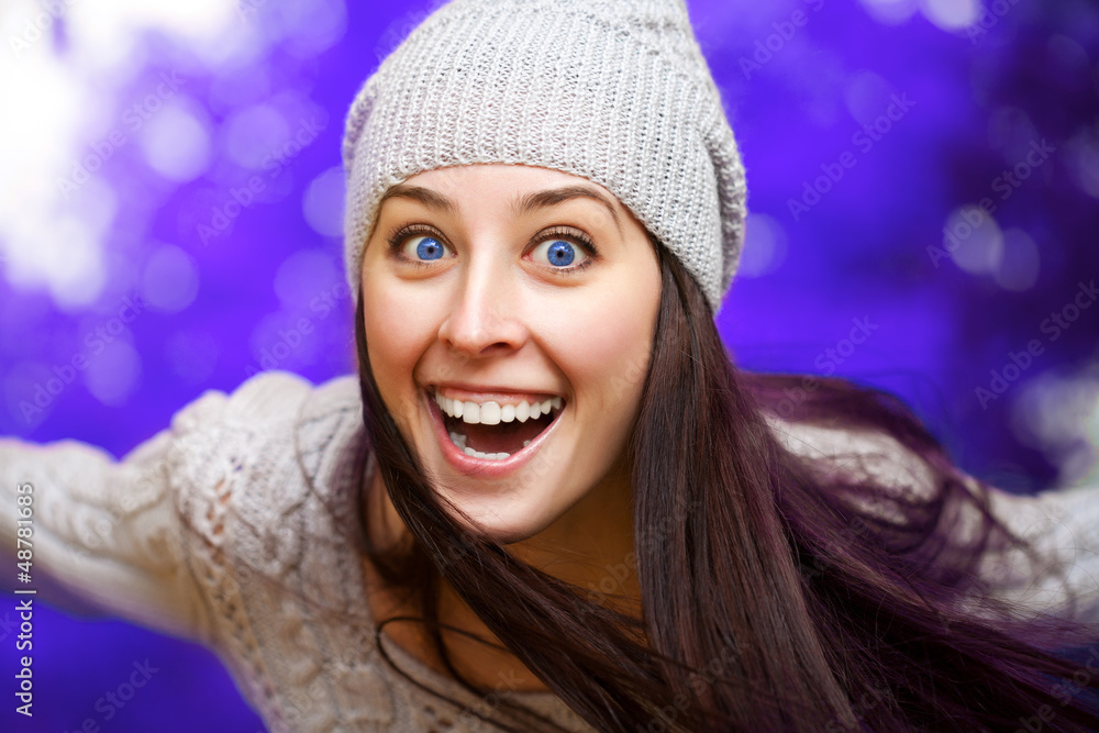 happy girl in hat on a winter background happy girl in hat on a winter background