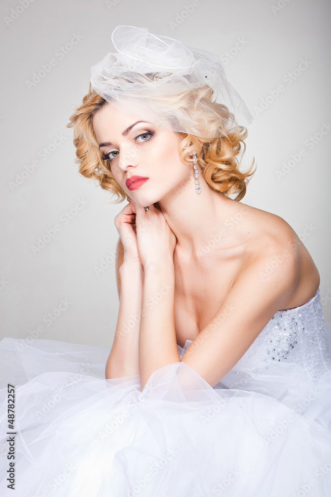 beautiful bride posing dramatic in the studio beautiful bride posing dramatic in the studio
