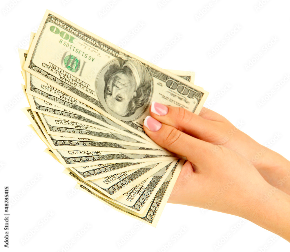 Female hand with dollars, close up, isolated on white Female hand with dollars, close up, isolated on white
