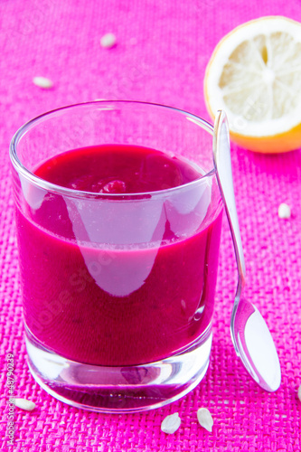 Beetroot cream soup with lemon in glass