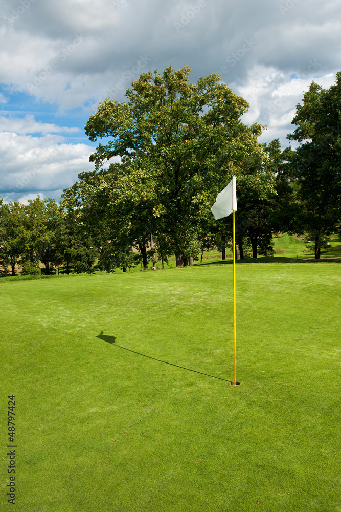 Fototapeta premium White flag in golf course