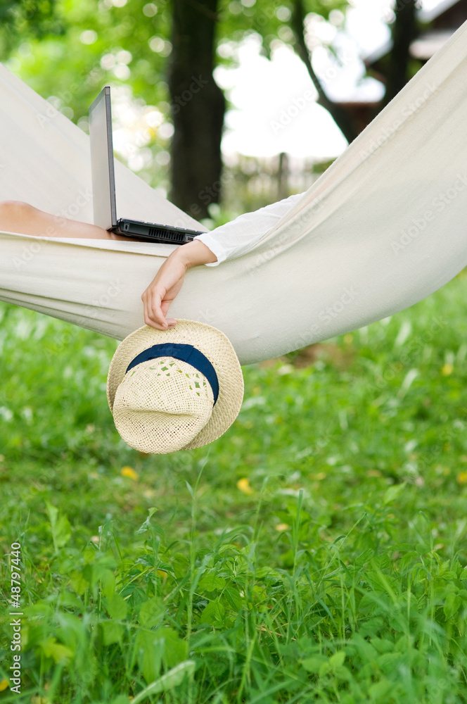 Naklejka premium Relaxing on hammock