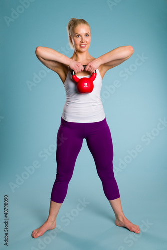 Girl and kettlebell