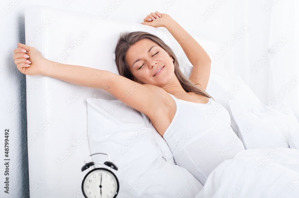Woman resting in bed Woman resting in bed