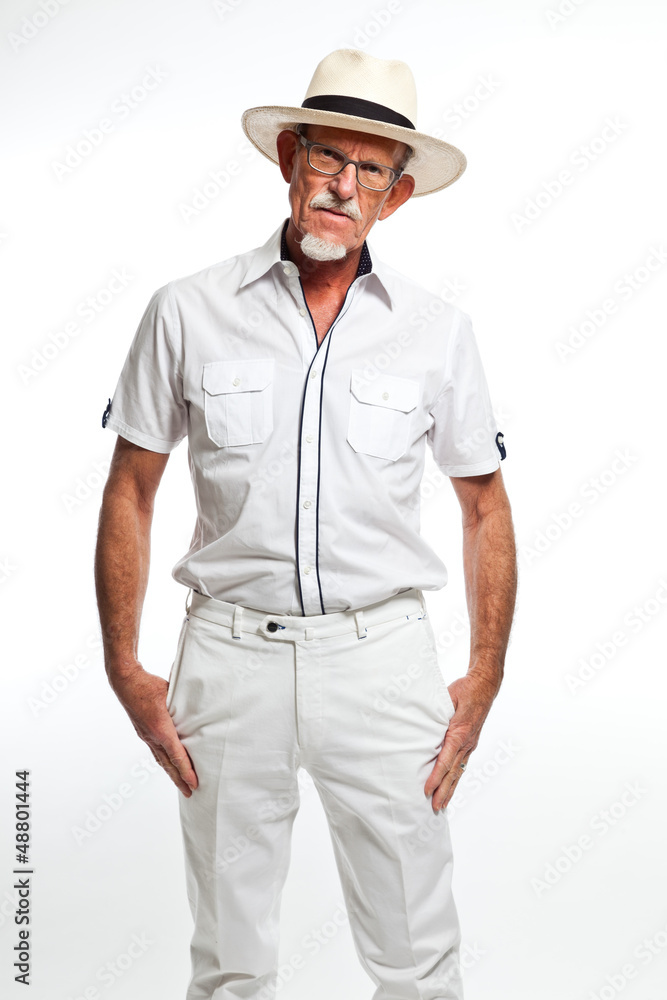 Well summer dressed senior man with hat. Isolated. Well summer dressed senior man with hat. Isolated.