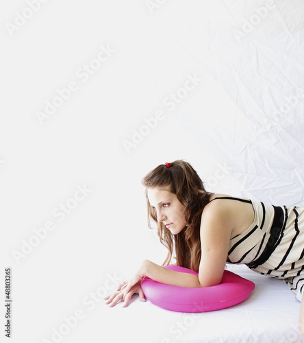 profile woman on pink pillow