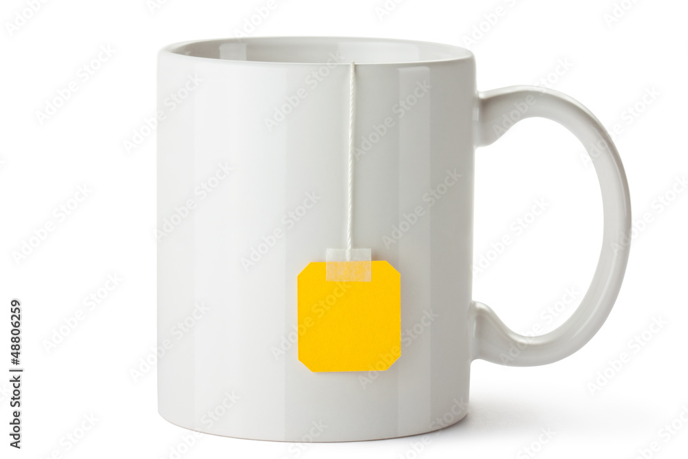 White ceramic mug with teabag label Stock Photo | Adobe Stock