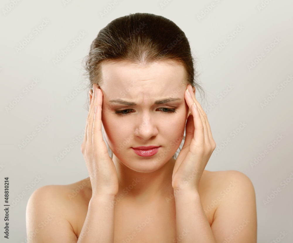 Young woman with head pain on white background Young woman with head pain on white background