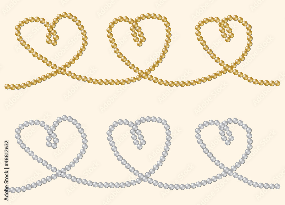 String of rare gold and silver pearls in a heart shape String of rare gold and silver pearls in a heart shape