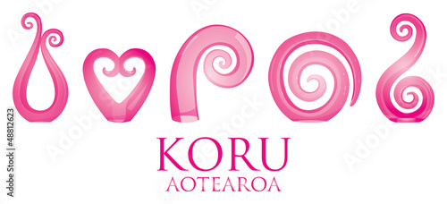 A set of pink glass Maori Koru curl ornaments. 