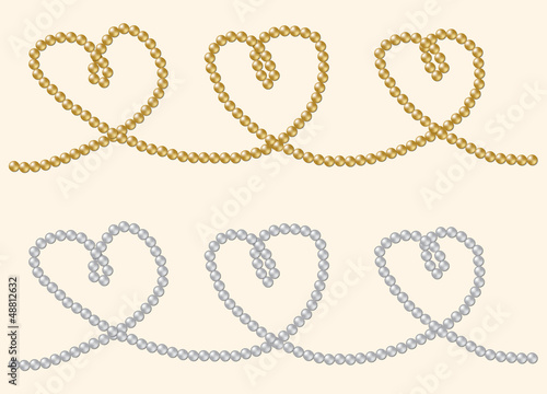 String of rare gold and silver pearls in a heart shape