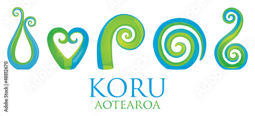 A set of glass Maori Koru curl ornaments.