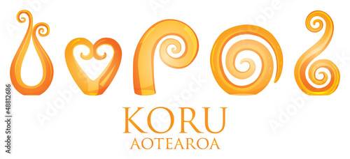 A set of orange glass Maori Koru curl ornaments.