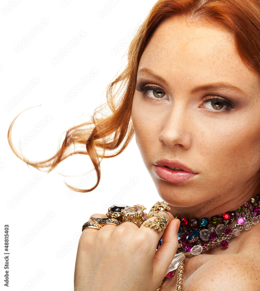 Beautiful attractive model with many multicolored jewelry