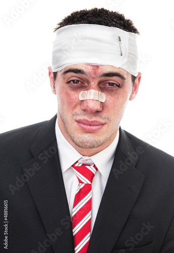 Beaten business man, close-up isolated on white