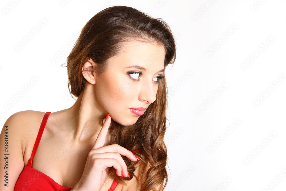 Portrait of beautiful girl in a red dress with makeup isolated o