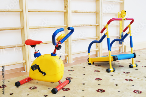 Small athletic simulators in a gymnastic hall for children