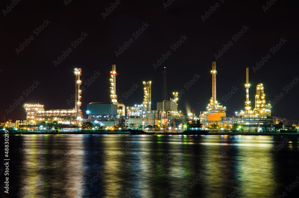 Oil refinery factory at night