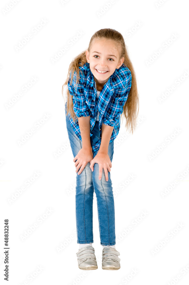 The girl in jeans and a checkered shirt The girl in jeans and a checkered shirt