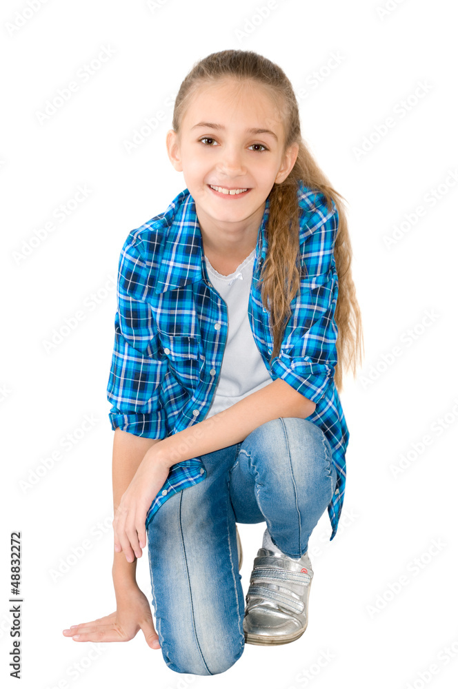 Fototapeta premium The girl in jeans and a checkered shirt