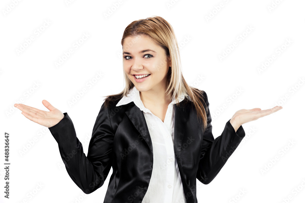 Attractive woman smiling to camera while showing something Attractive woman smiling to camera while showing something