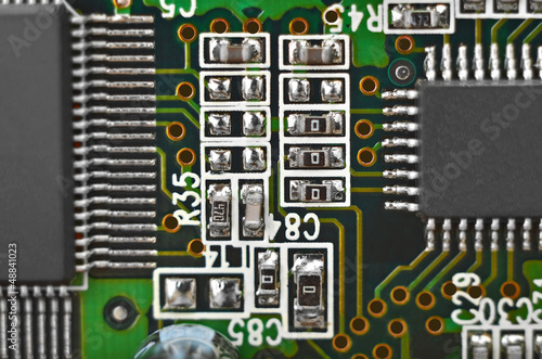 Close up of a printed green computer circuit board