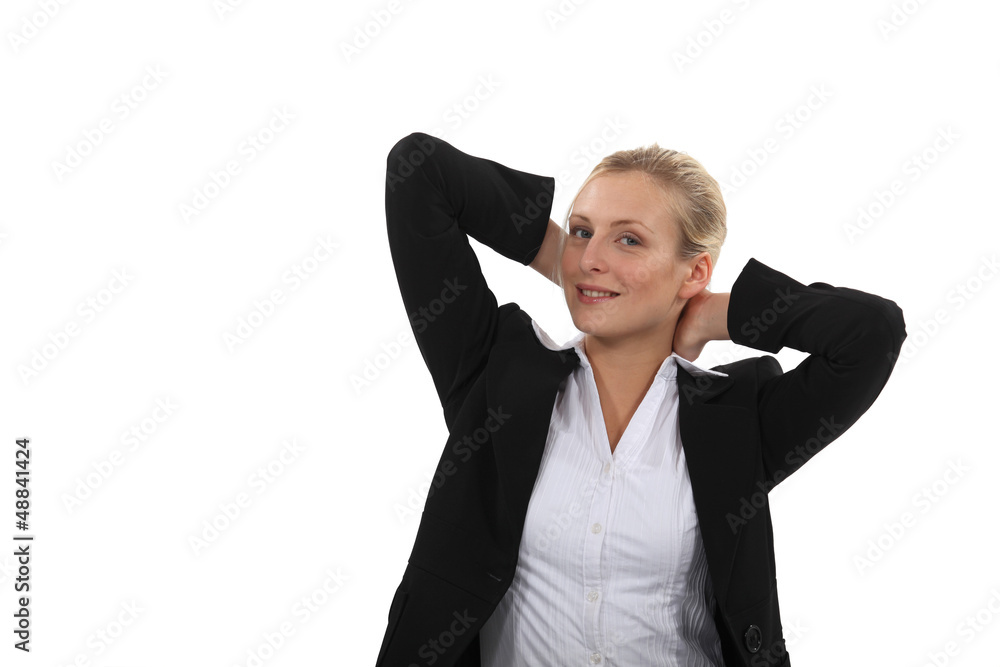 beautiful blonde with arms behind her head relaxing beautiful blonde with arms behind her head relaxing