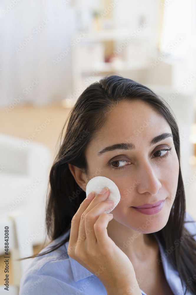 Caucasian businesswoman wiping her face Caucasian businesswoman wiping her face