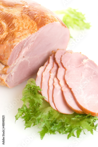 Sliced ham with salad