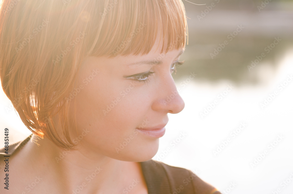 Red woman in warm sunshine Red woman in warm sunshine