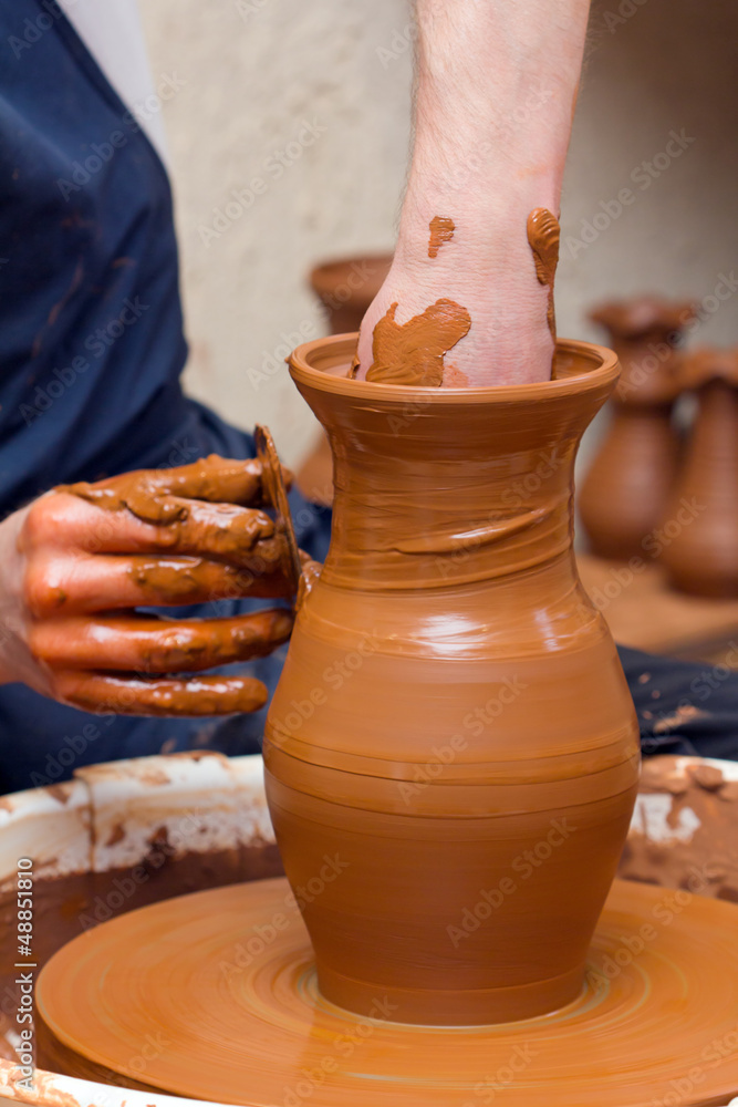 potter makes a jug out of clay potter makes a jug out of clay