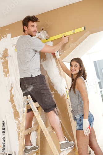 Принти на полотні Young couple building new home