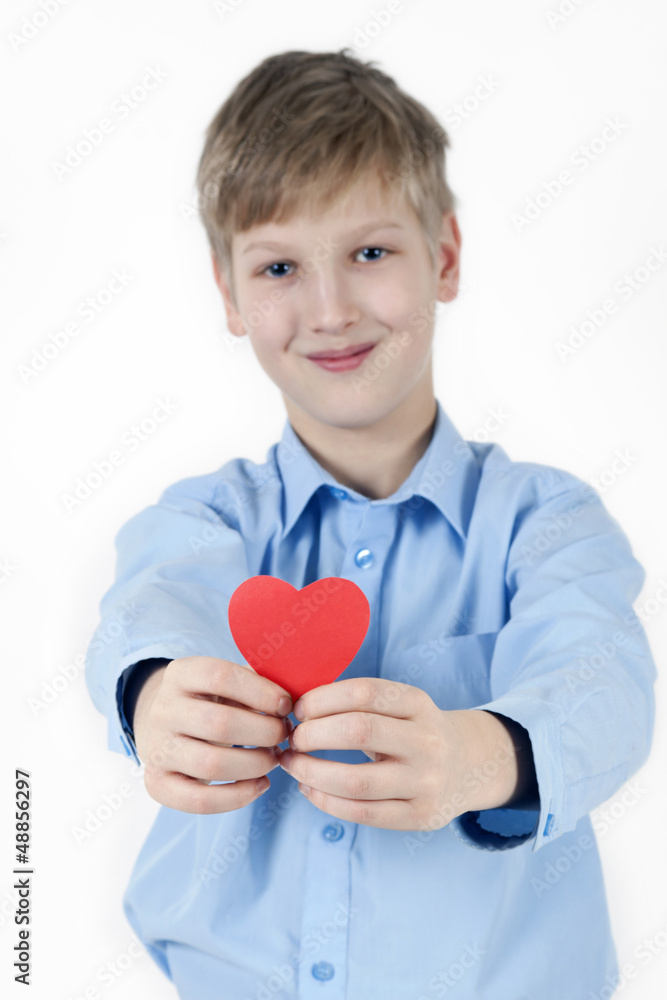 Smiling boy and red heart. Valentines Day concept. Smiling boy and red heart. Valentines Day concept.