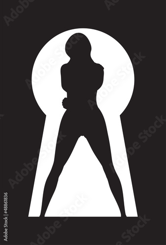 silhouette of a woman figure seen through a key hole