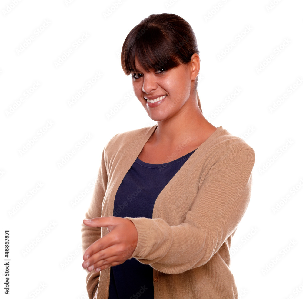 Smiling pretty young woman extending handshake Smiling pretty young woman extending handshake