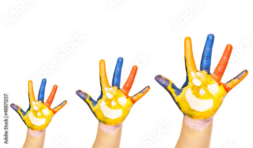 Three colorful hands with smiling face of family