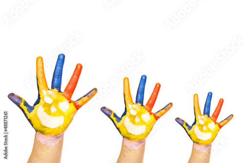 Three colorful hands with smiling face of family