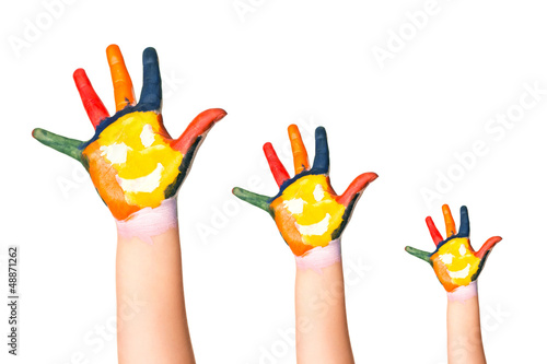 Three colorful hands with smiling face of family