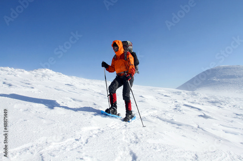 Winter hiking in snowshoes.