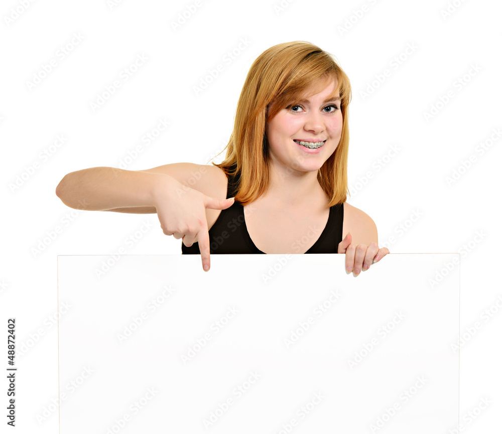 Young girl with brackets and white billboard Young girl with brackets and white billboard