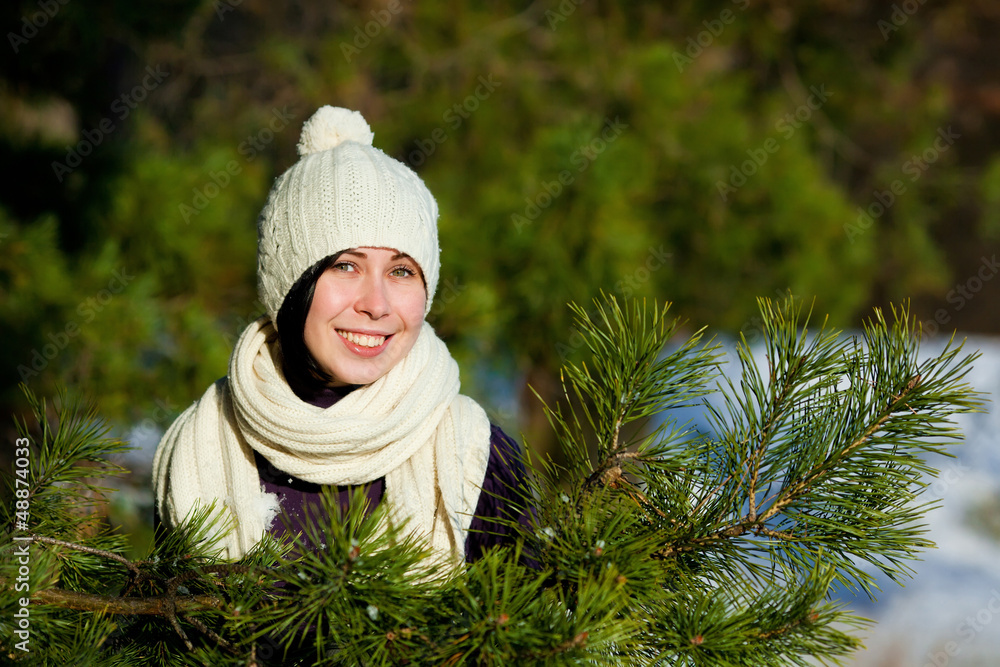 Beautiful young woman smiling in winter