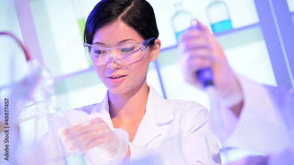 Multi Ethnic Students Working in Hospital Laboratory Multi Ethnic Students Working in Hospital Laboratory