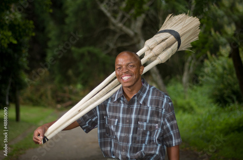 South African entrepreneur small business broom salesman