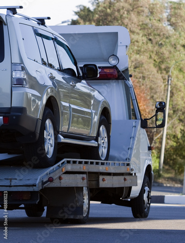 tow truck loaded up the car