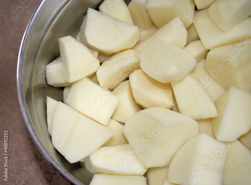 Fresh Peeled Potatoes In A Pot Of Water - ready for cooking