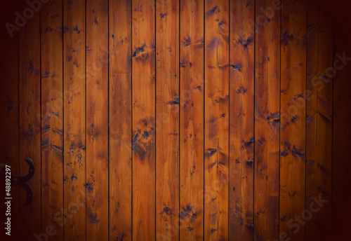 Renibated wood gate with vignettes on edges