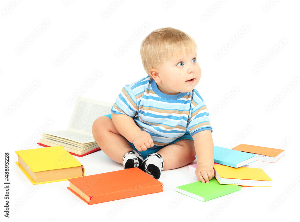 Little boy with multicolor books, isolated on white Little boy with multicolor books, isolated on white