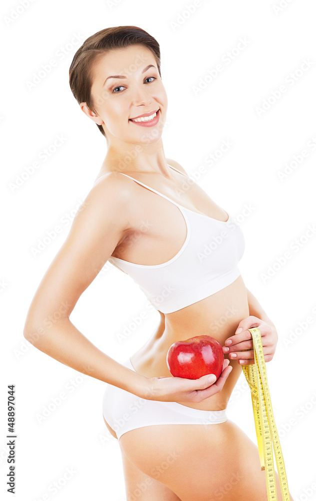 friendly beautiful girl in white with measure and red apple friendly beautiful girl in white with measure and red apple